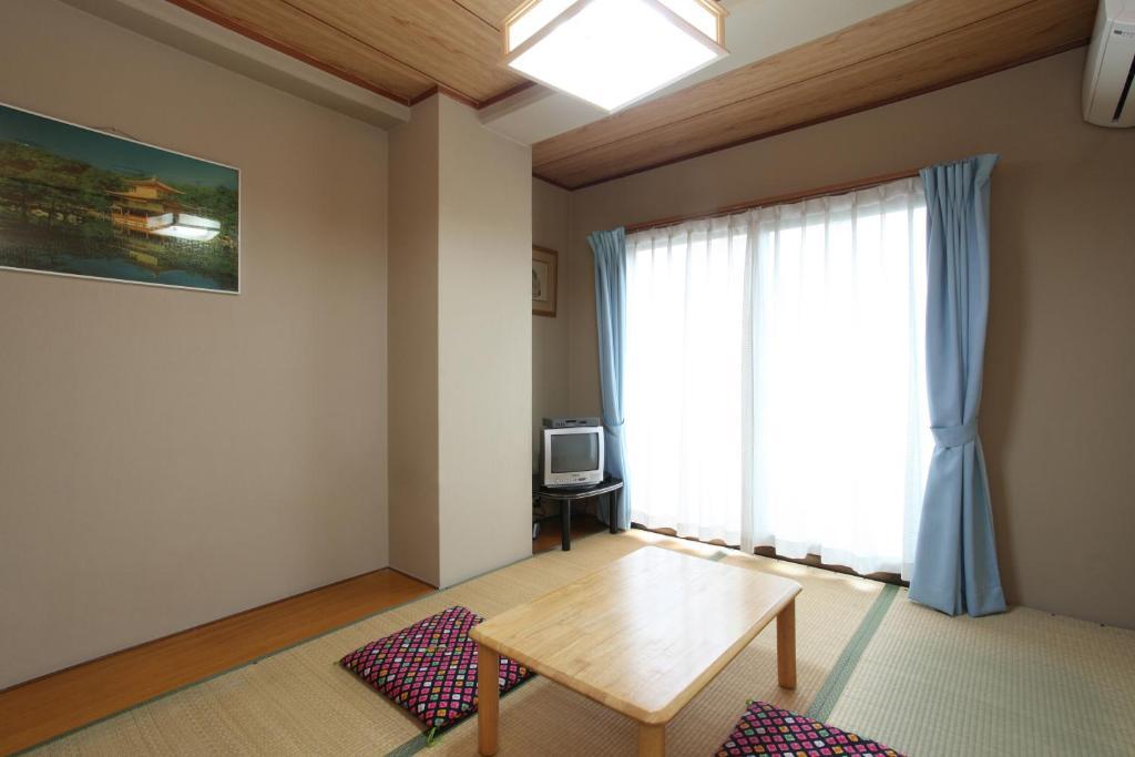 Business Hotel Nishi Ocu Szoba fotó